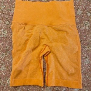 Orange seamless workout shorts